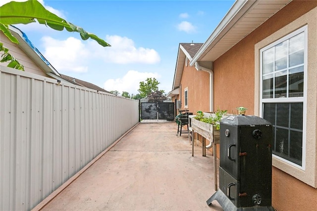 2930 Laurie Ln, Marrero, LA 70072 - view of patio featuring fence and a gate