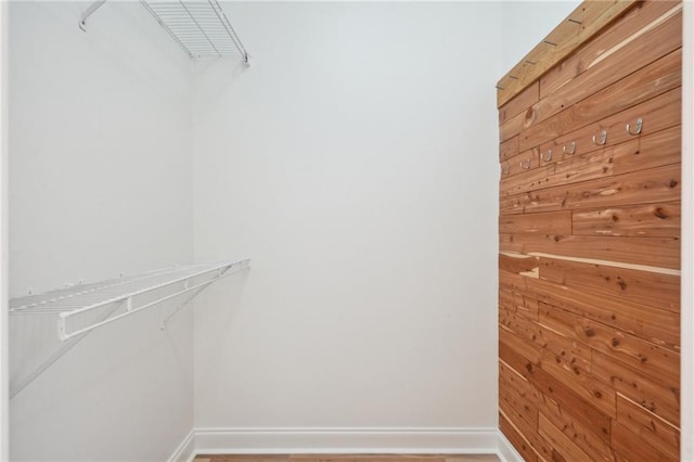 125 Secluded Forest Way, Madisonville, LA 70447 - spacious closet with wood finished floors
