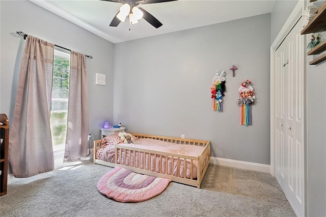 19916 Church Branch Rd, Springfield, LA 70462 - bedroom featuring carpet flooring, a closet, a ceiling fan, and baseboards
