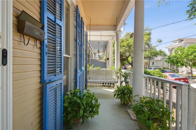 8216 Spruce St, New Orleans, LA 70118 - balcony featuring covered porch