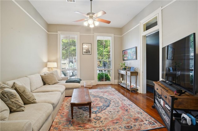 8216 Spruce St, New Orleans, LA 70118 - living area with ceiling fan and wood finished floors