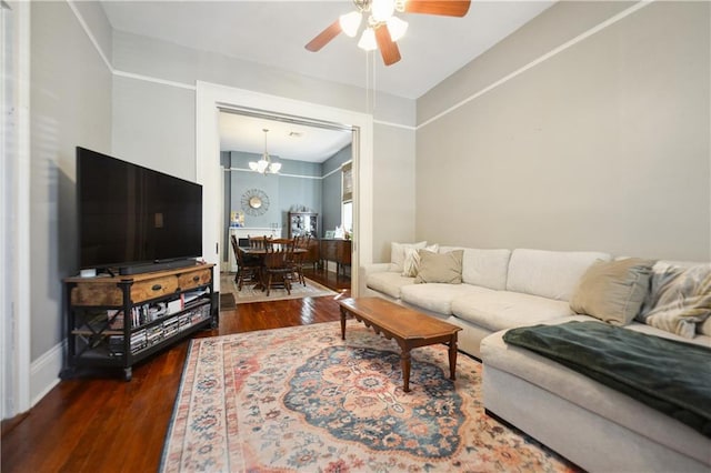 8216 Spruce St, New Orleans, LA 70118 - living room featuring ceiling fan, wood finished floors, and a chandelier