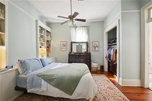 8216 Spruce St, New Orleans, LA 70118 - bedroom with wood finished floors, a closet, and ceiling fan