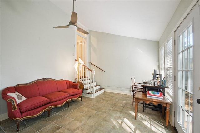 8216 Spruce St, New Orleans, LA 70118 - living area with baseboards, ceiling fan, stairs, and stone finish flooring
