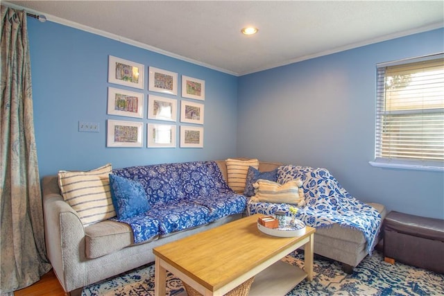living area with ornamental molding, recessed lighting, and wood finished floors