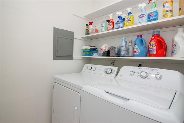 laundry room featuring separate washer and dryer and electric panel