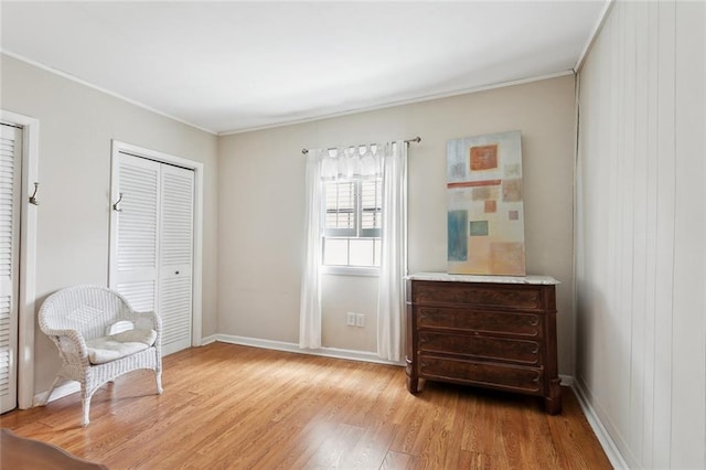 403 Athania Pkwy, Metairie, LA 70001 - sitting room with light wood-style flooring, crown molding, and baseboards