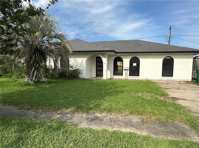 1561 Curtis St, Harvey, LA 70058 - view of front of home featuring a front yard and roof with shingles