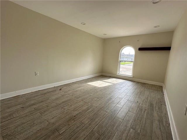 1561 Curtis St, Harvey, LA 70058 - unfurnished room featuring dark wood-type flooring and baseboards