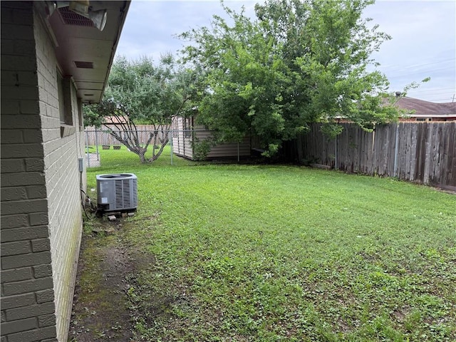 view of yard featuring central AC