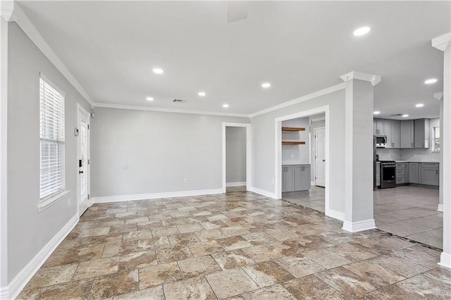4933 Sanford St, Metairie, LA 70006 - unfurnished living room featuring stone tile floors, baseboards, crown molding, and recessed lighting