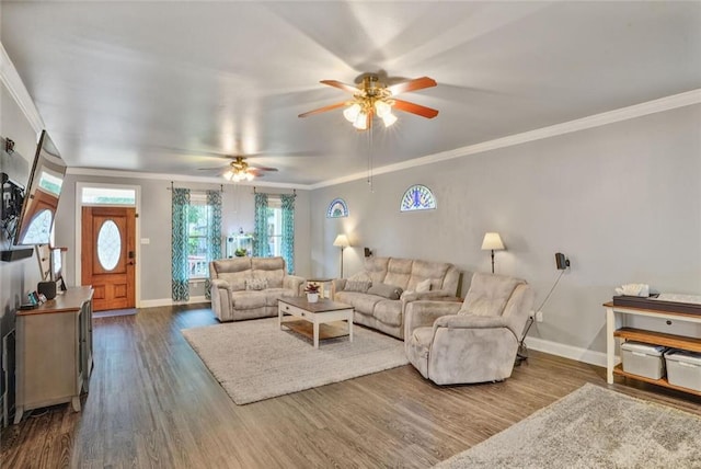 700 Kent Ave, Metairie, LA 70001 - living room with crown molding, a ceiling fan, baseboards, and dark wood-style flooring