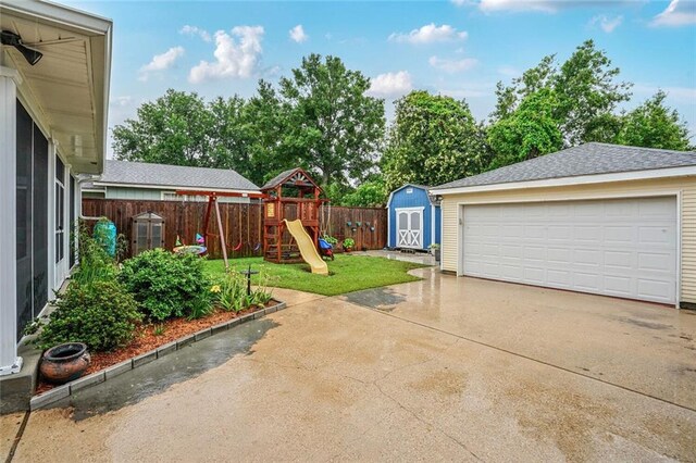 700 Kent Ave, Metairie, LA 70001 - detached garage featuring a storage shed