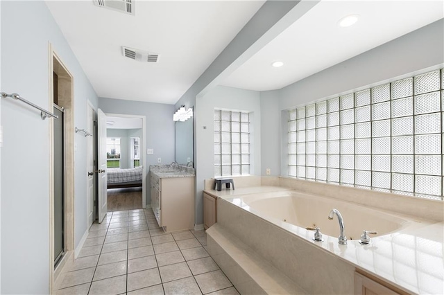 602 Willowdale Blvd, Luling, LA 70070 - full bath with vanity, tile patterned floors, a stall shower, a tub with jets, and ensuite bathroom
