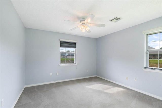 602 Willowdale Blvd, Luling, LA 70070 - empty room with carpet, a ceiling fan, baseboards, and a textured ceiling