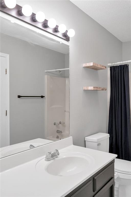 3737 James Victor Dr, Baton Rouge, LA 70817 - full bathroom featuring toilet and vanity