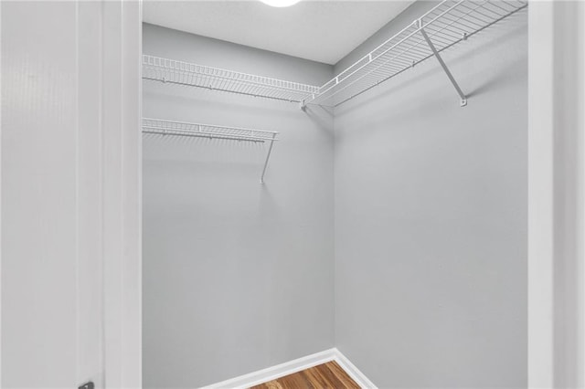 3737 James Victor Dr, Baton Rouge, LA 70817 - walk in closet with wood finished floors