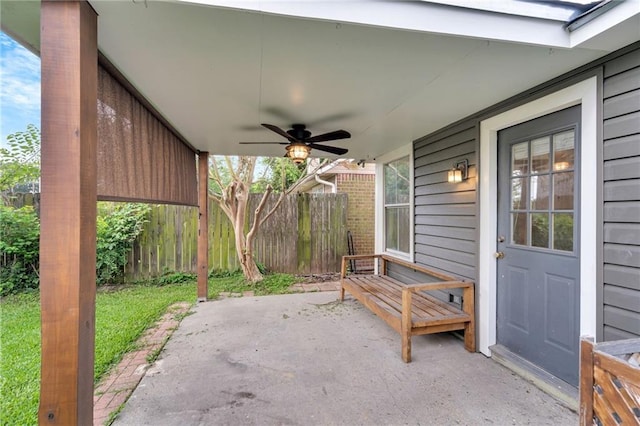 3737 James Victor Dr, Baton Rouge, LA 70817 - view of patio / terrace with a ceiling fan and fence