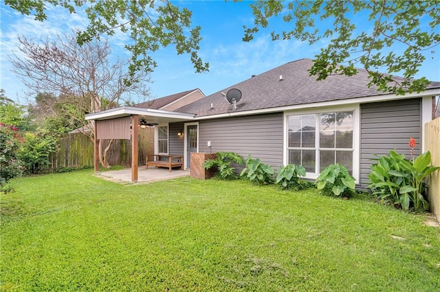 3737 James Victor Dr, Baton Rouge, LA 70817 - rear view of house featuring a patio area, a ceiling fan, and roof with shingles