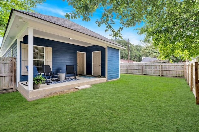 3986 Main St, Zachary, LA 70791 - rear view of property featuring a patio and roof with shingles