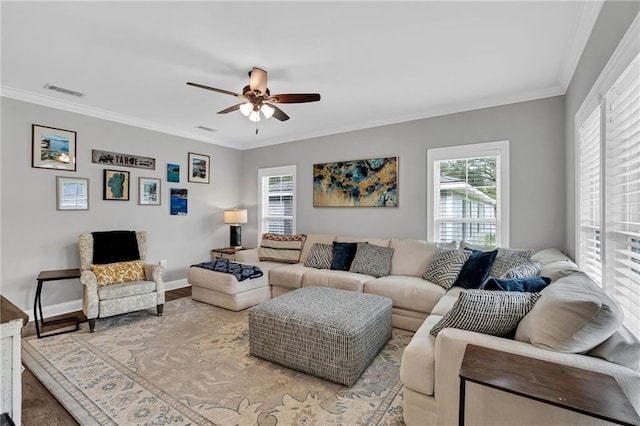3986 Main St, Zachary, LA 70791 - living area featuring ceiling fan, ornamental molding, wood finished floors, and baseboards
