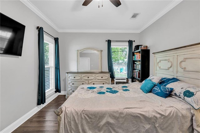 3986 Main St, Zachary, LA 70791 - bedroom with ornamental molding, dark wood-style flooring, baseboards, and ceiling fan