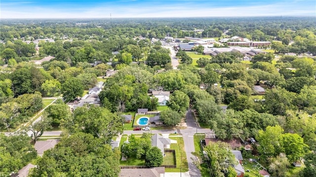 3986 Main St, Zachary, LA 70791 - aerial view of property's location featuring a heavily wooded area