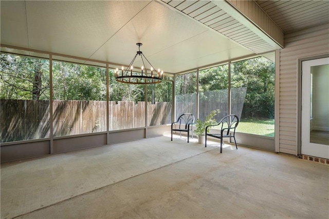 212 Highland Oak N, Madisonville, LA 70447 - unfurnished sunroom with a chandelier and unfinished concrete floors
