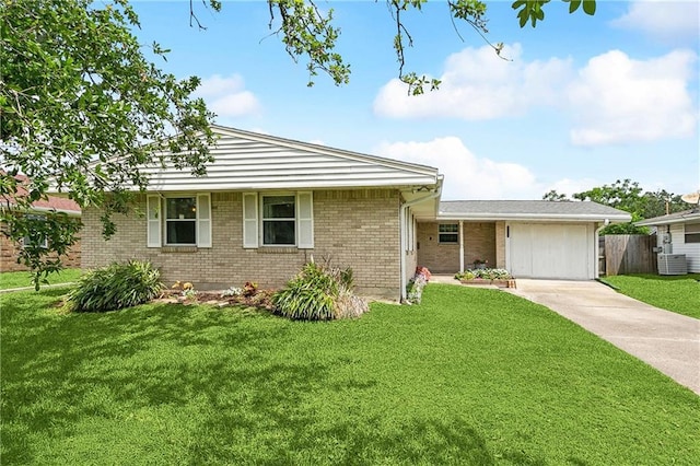 ranch-style home with concrete driveway, a garage, brick siding, and central AC unit