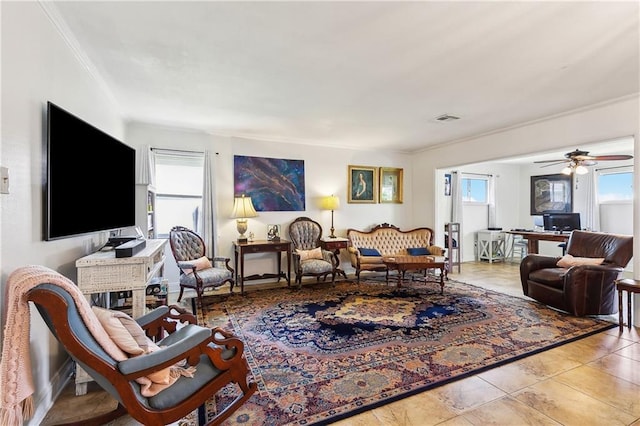 6417 Kawanee Ave, Metairie, LA 70003 - living area with ornamental molding and a ceiling fan