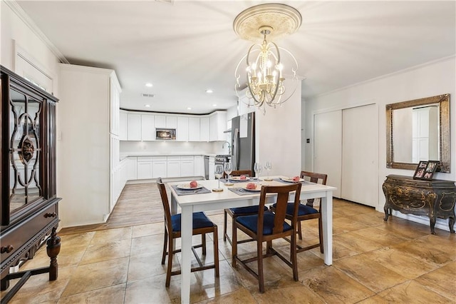 6417 Kawanee Ave, Metairie, LA 70003 - dining area featuring ornamental molding, a chandelier, and recessed lighting