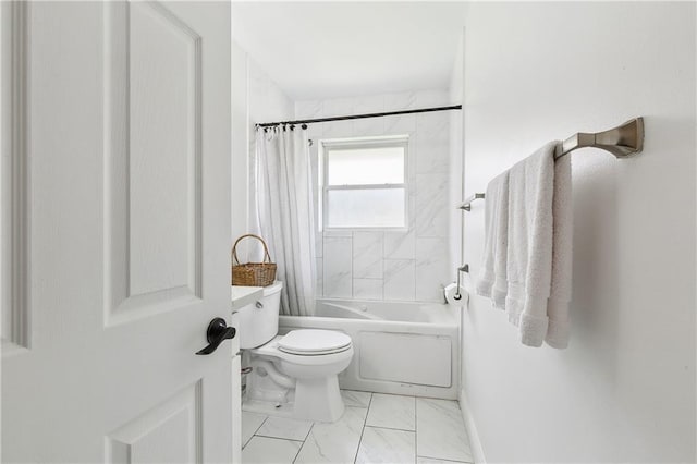 full bathroom with marble finish floors, toilet, and shower / bath combo with shower curtain