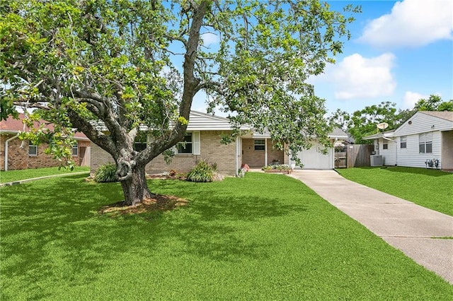 6417 Kawanee Ave, Metairie, LA 70003 - view of front of house featuring concrete driveway, brick siding, and central AC unit