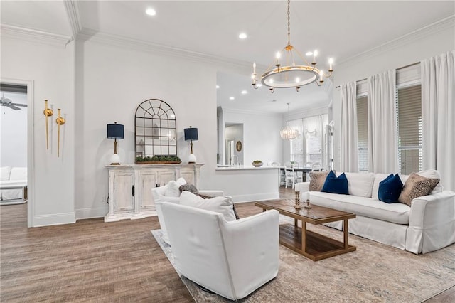 336 Rue St, Emilion, Covington, LA 70433 - living room with a chandelier, baseboards, ornamental molding, and recessed lighting