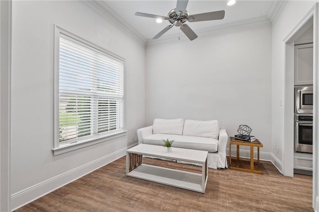 336 Rue St, Emilion, Covington, LA 70433 - sitting room featuring crown molding, wood finished floors, ceiling fan, baseboards, and recessed lighting