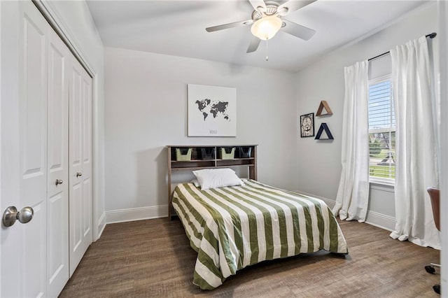 336 Rue St, Emilion, Covington, LA 70433 - bedroom featuring baseboards, a closet, ceiling fan, and wood finished floors