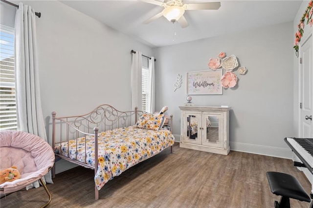 336 Rue St, Emilion, Covington, LA 70433 - bedroom with multiple windows, baseboards, wood finished floors, and a ceiling fan