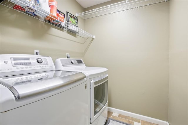 126 Silverwood Dr, Slidell, LA 70461 - laundry area with separate washer and dryer and baseboards