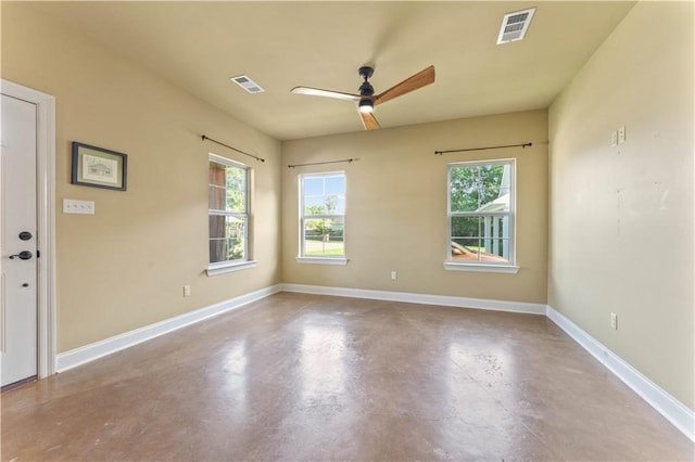 200 Cotton Ln, Hammond, LA 70401 - spare room featuring concrete flooring, a ceiling fan, and baseboards