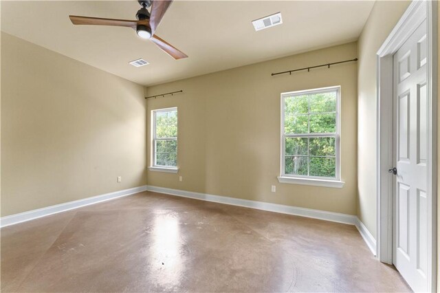 200 Cotton Ln, Hammond, LA 70401 - empty room with concrete flooring, ceiling fan, and baseboards
