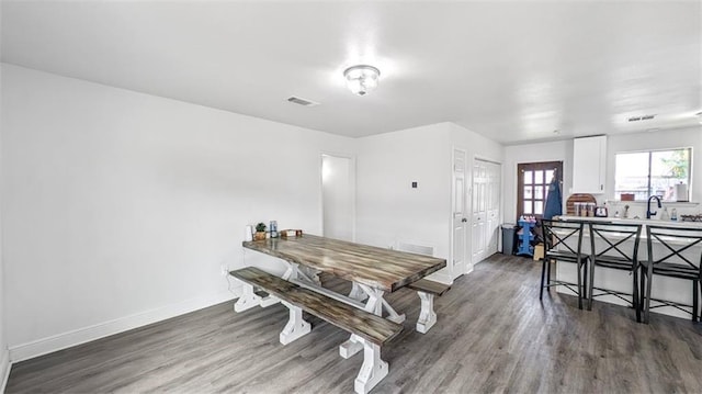 778 Heritage Ave, Gretna, LA 70056 - dining area with wood finished floors and baseboards