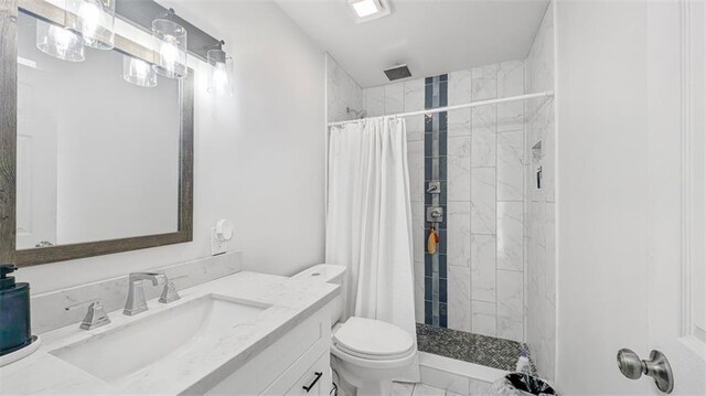 778 Heritage Ave, Gretna, LA 70056 - bathroom with a stall shower, vanity, and toilet