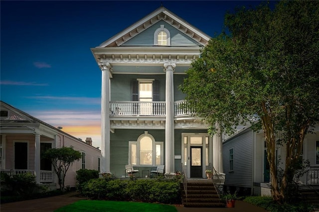 5925 Annunciation St, New Orleans, LA 70115 - neoclassical home with covered porch and a balcony