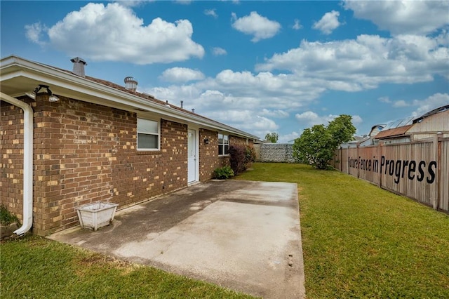 view of yard with a patio area
