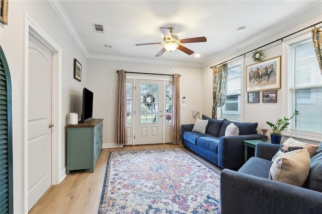3222 Orleans Ave, New Orleans, LA 70119 - living room with light wood finished floors, a ceiling fan, ornamental molding, recessed lighting, and baseboards