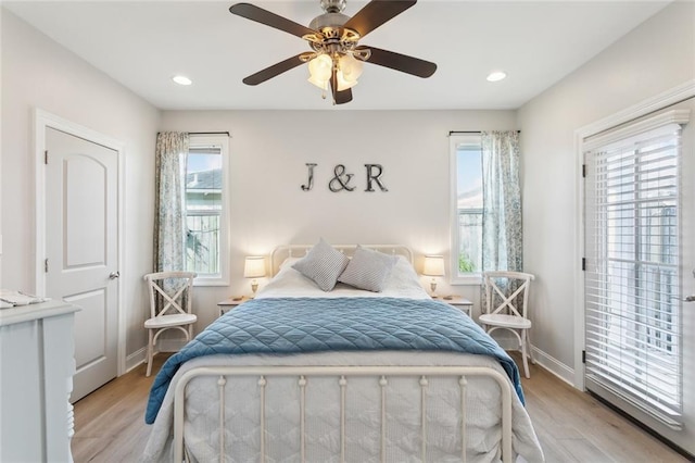 3222 Orleans Ave, New Orleans, LA 70119 - bedroom featuring multiple windows, baseboards, light wood-style flooring, and recessed lighting