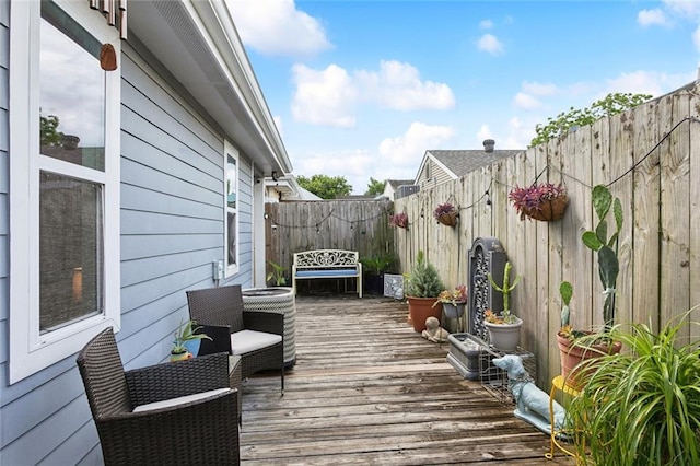 3222 Orleans Ave, New Orleans, LA 70119 - deck featuring a fenced backyard and central air condition unit