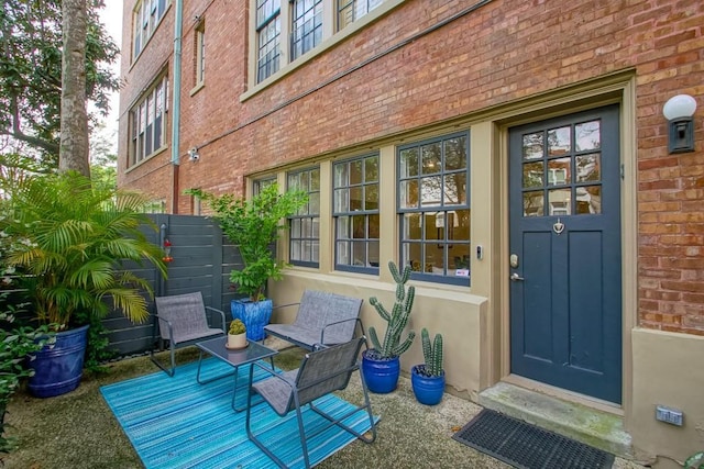 1115 Upperline St Unit 1115, New Orleans, LA 70115 - property entrance with brick siding and fence