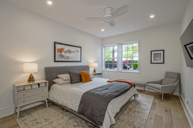 1115 Upperline St Unit 1115, New Orleans, LA 70115 - bedroom with wood finished floors, recessed lighting, baseboards, and a ceiling fan