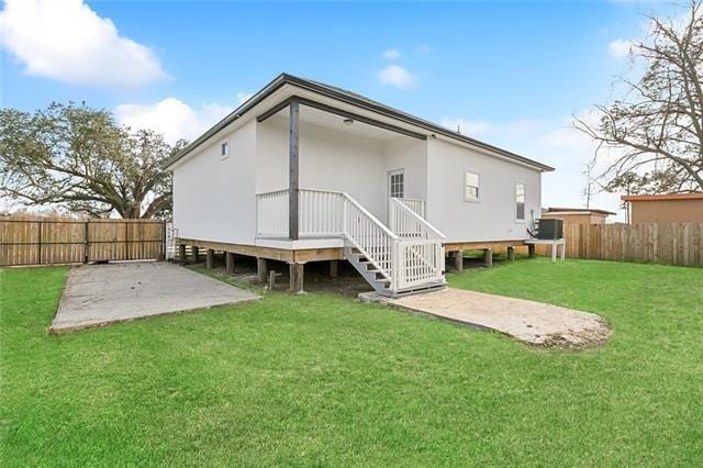 rear view of house with a patio area